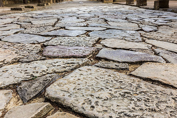 Italica, S. Ancient Roman road in Italica. italica spain stock pictures, royalty-free photos & images