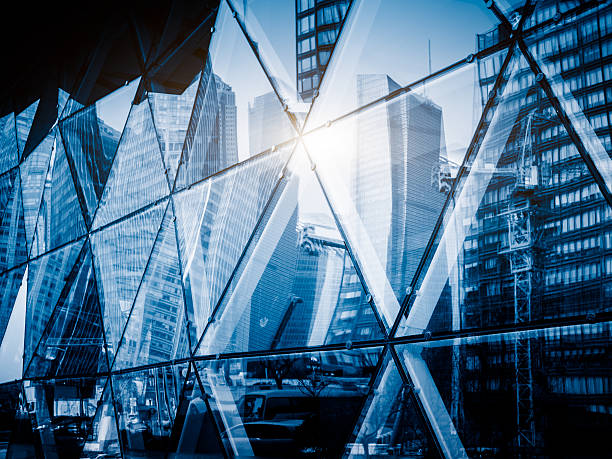 istock View of a modern glass skyscraper reflecting the blue sky 534035226