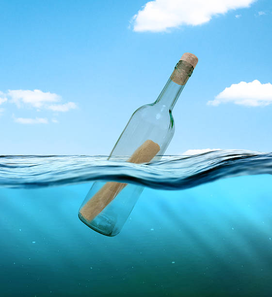 istock Bottle with a letter from the wreck 534035789