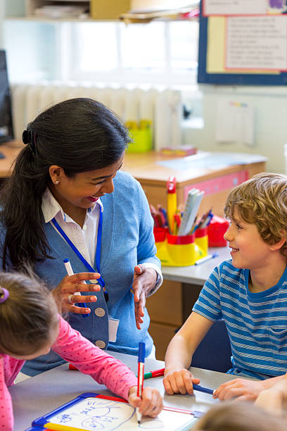 istock Little Artist with his Teacher 534039112