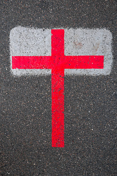istock Red cross painted on the surface of asphalt road 534039638