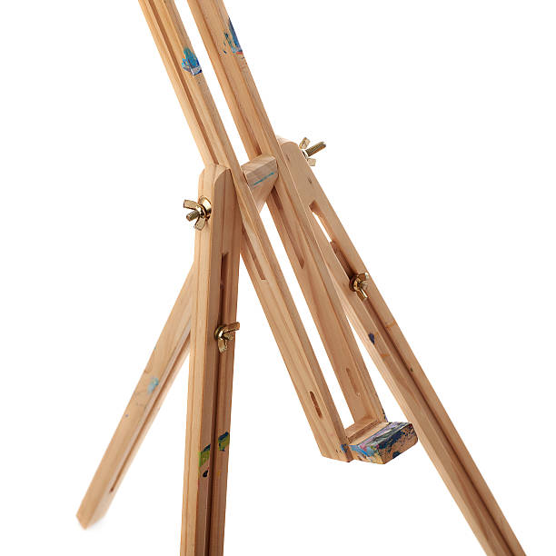 istock Wooden easel over isolated white background 534039734