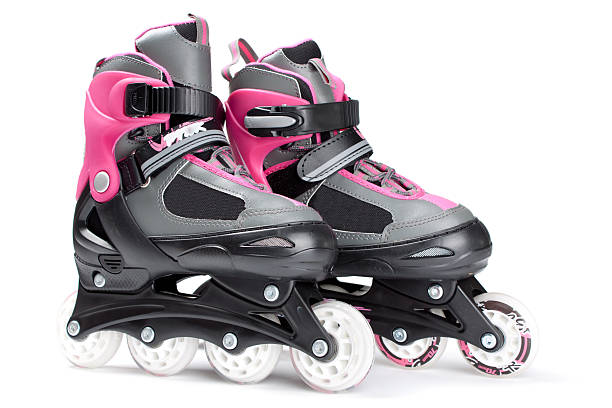 istock Pink roller skates isolated on white background 534043911