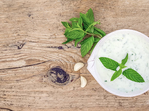 istock Cold summer yogurt and cucumber soup with fresh herbs 534044023