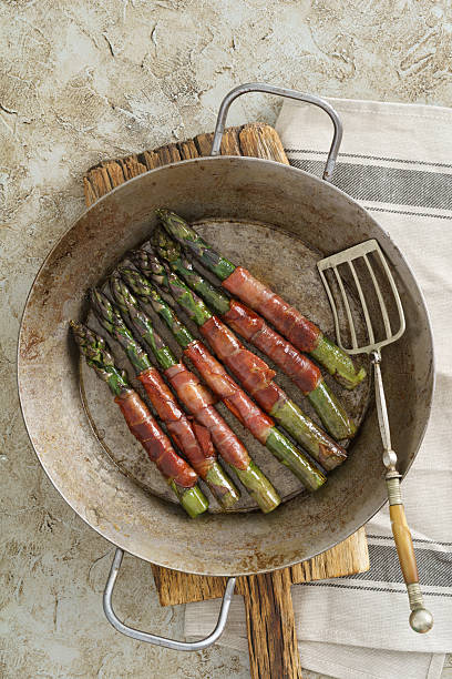 istock Purple asparagus with gammon 534044634