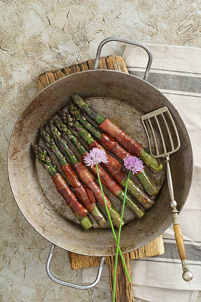 istock Purple asparagus with gammon 534044720
