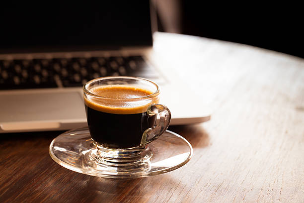istock cup of espresso on a wooden background table. 534045775
