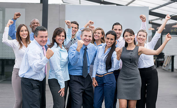 istock Successful group of business people celebrating 534045988