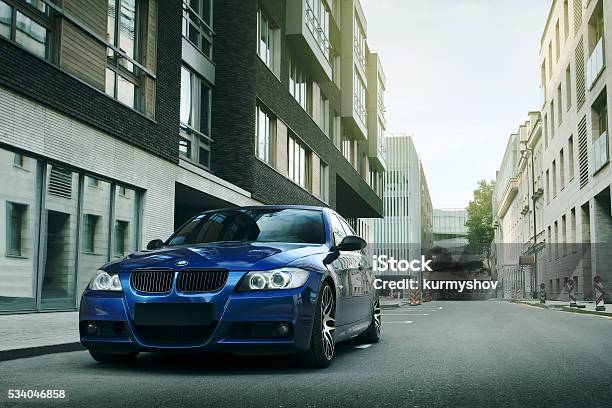 Blue Car Bmw 5 Series E90e91 Stay On Asphalt Road Stock Photo - Download Image Now - BMW, Road, Car