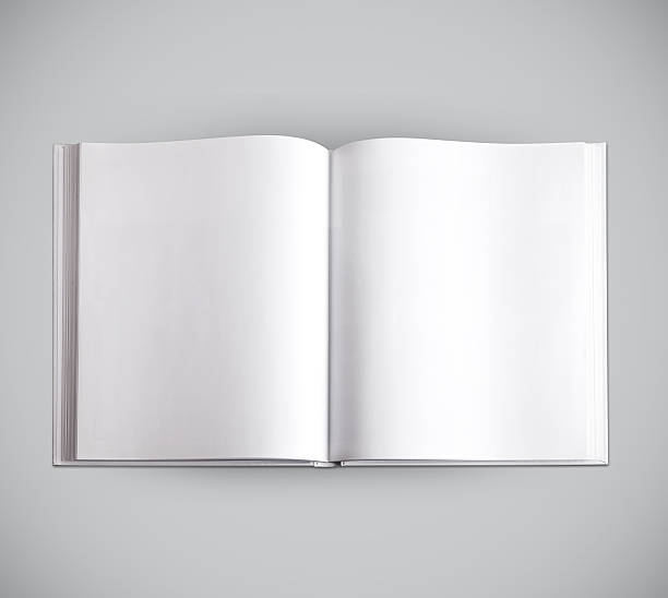 istock open hardcover book with blank pages isolated on grey 534047247