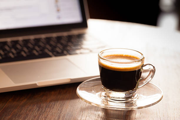 istock cup of espresso on a wooden background table. 534047559