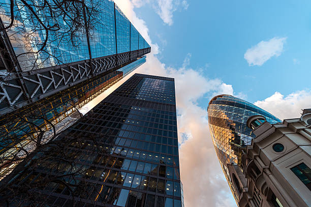 istock Low angle view modern glass and steel buildings against sky 534049058