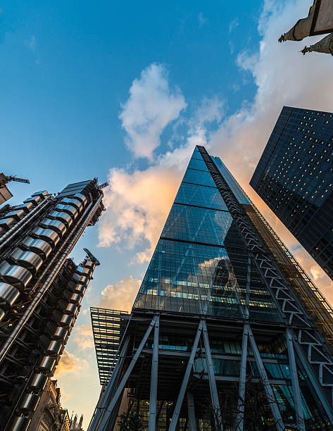 istock Low angle view modern buildings against sky at sunset 534049164
