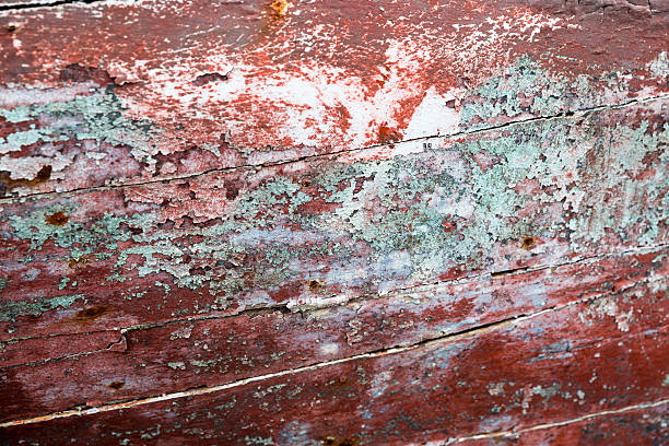 istock Old wooden rusty boat paint spilled surface closeup background 534049962