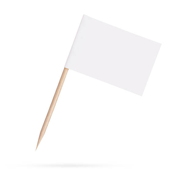 blank white flag.Isolated on white background Miniature blank white flag. Ready for a Message .Isolated on white background.With clipping path cocktail stick stock pictures, royalty-free photos & images