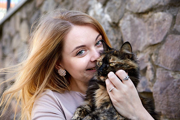 istock Young fashion woman wuth cat 534050926