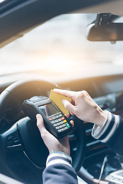 istock Swiping credit card with wireless POS machine 534051154