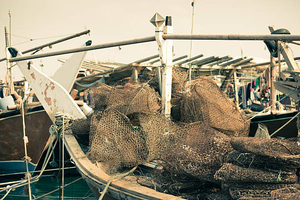 istock Old fishing boats with rusty nets 534051441