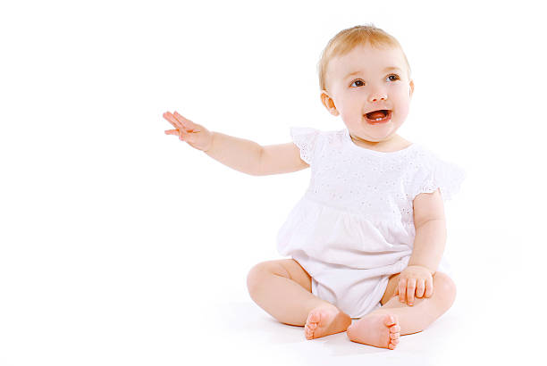 istock Little baby having fun on a white background 534051717