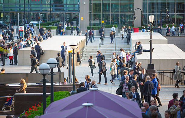 istock London, Canary wharf square with walking people 534052266