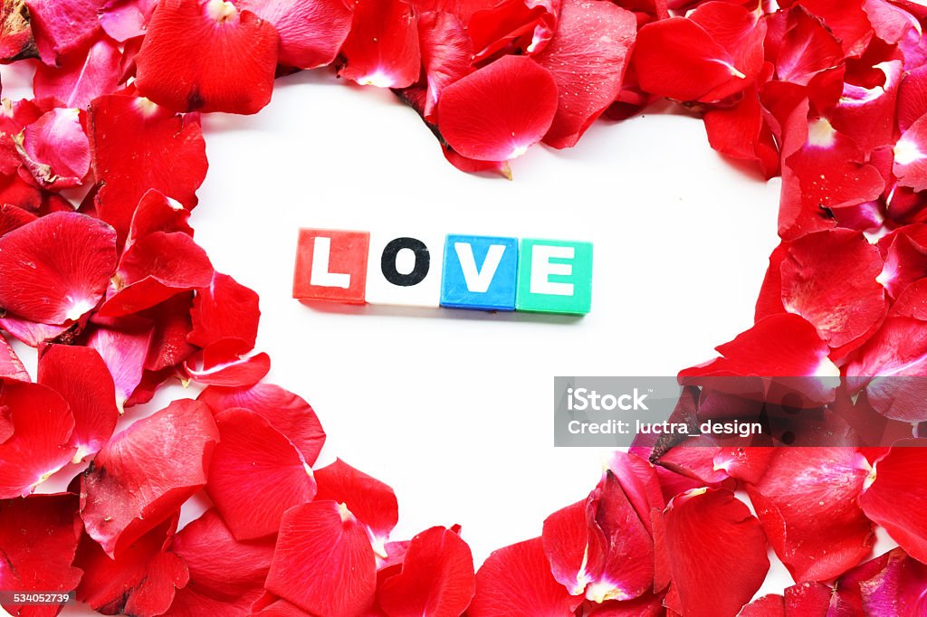 beautiful heart of red rose petals isolated on white http://goo.gl/oKlGnN 2015 Stock Photo