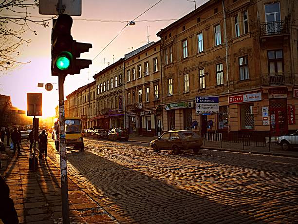 istock Sunset on the road with traffic lights 534053380