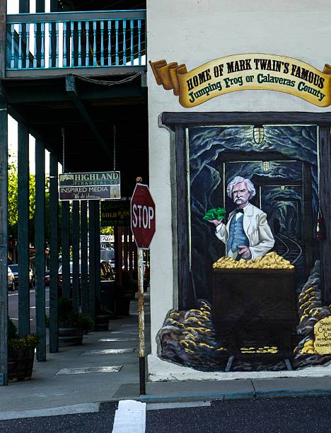Angel Camp, California, USA - May 27, 2014: The quaint downtown of Angel Camp featuring a mural of Mark Twain. Located in Calaveras County, Angel Camp is the setting for Mark Twain's famous story: The Celebrated Jumping Frog of Calaveras County.