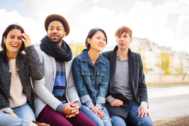 istock Multi-ethnic group of friends having fun in Paris along Seine 534053812
