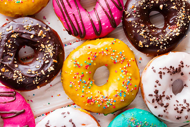 istock Different tasty donuts on a white background top view 534053880