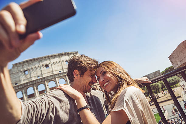 istock Lovers taking a selfie in front of the Coliseum 534054113