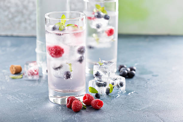 istock Sparkling water with berry and herb ice 534057272