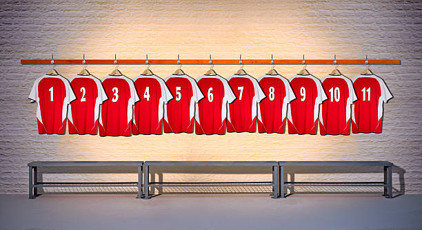 Row of Football Shirts Red 1-11 stock photo