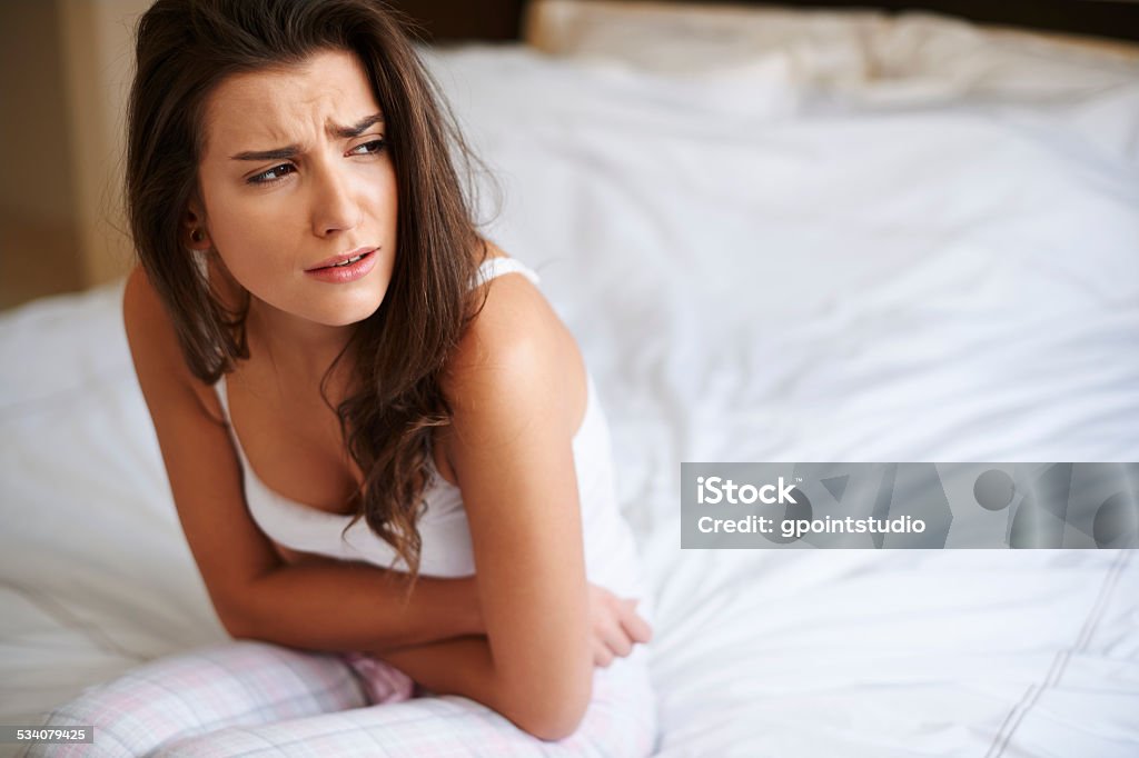 This pain is so exhaustive PMS Stock Photo