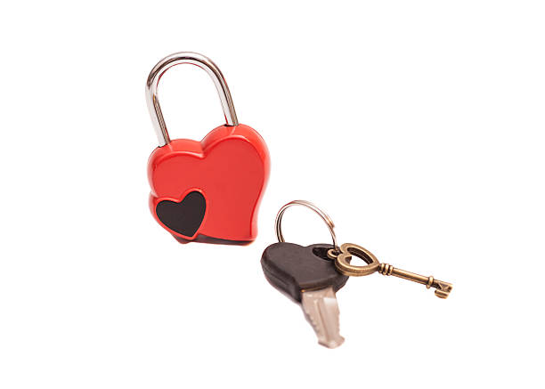 istock Locked shaped heart and keys isolated on white 534079969