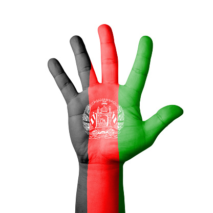 Open hand raised, Afghanistan flag painted