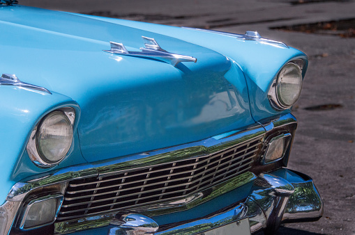 Classic blue car (fifties) standing in a street in Havana, Cuba.