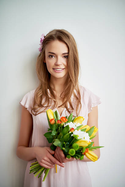 istock Woman with fresh flowers 534085287