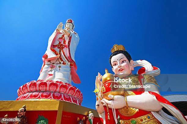 Guanyin Goddess Of Mercy And Child God Stock Photo - Download Image Now - 2015, Asia, Backgrounds