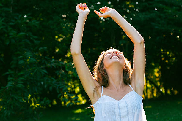 istock Happy woman enjoying sun 534096789