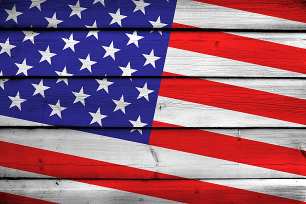 istock USA Flag on wood background 534097125