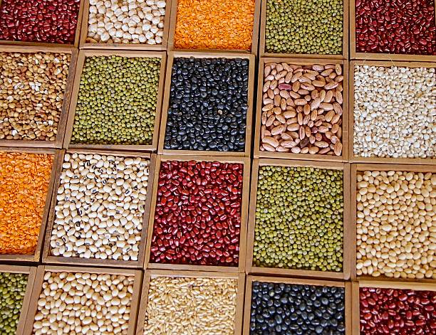 Closeup of seeds and grains in wooden box
