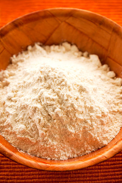 istock wheat flour in wooden bowl 534097589