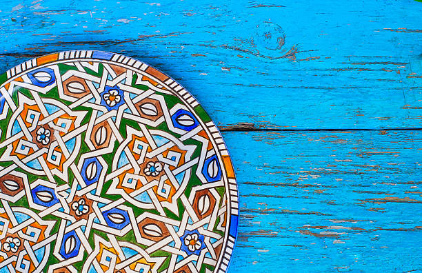 Vintage Plate on wooden background in blue color
