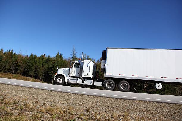 istock Semi truck on a highway 534102099