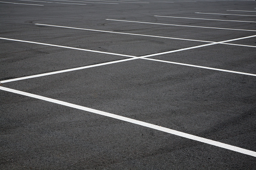 Close focus image of a generic parking lot.
