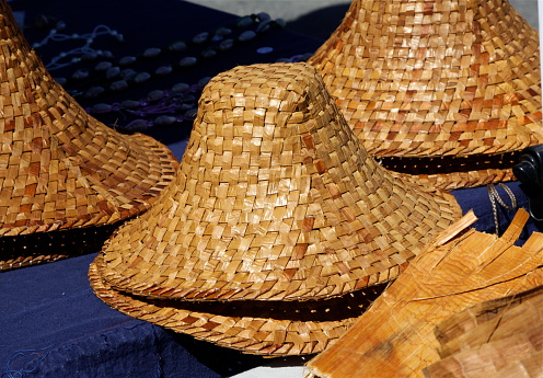 Hand woven Native American hats for sale at outdoor market