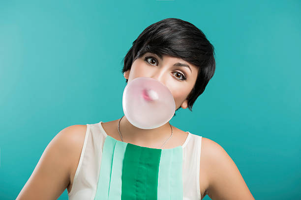 istock Girl with a bubble gum 534105863