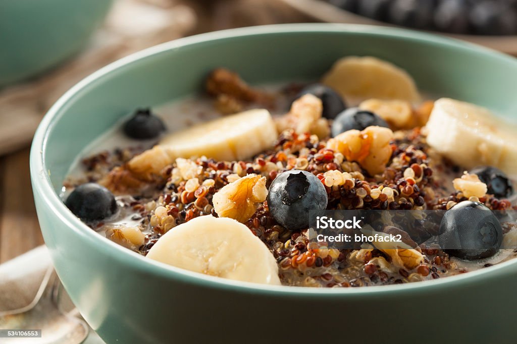 Organic Breakfast Quinoa with Nuts Organic Breakfast Quinoa with Nuts Milk and Berries 2015 Stock Photo