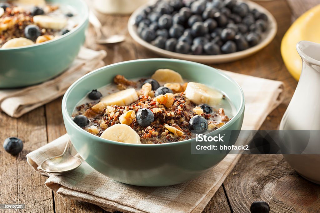 Organic Breakfast Quinoa with Nuts Organic Breakfast Quinoa with Nuts Milk and Berries 2015 Stock Photo