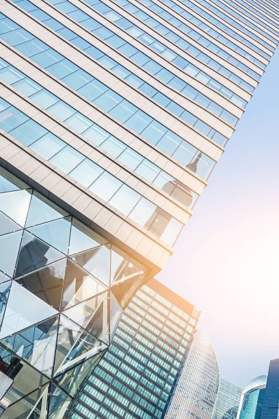 istock low angle view of skyscraper against sunbeam 534108490